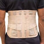 Man wearing back brace. Shoreside Interventional Pain in Sarasota, Florida.
