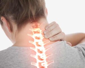 Person holding neck with spine overlaid in red to show neck pain. Shoreside Pain - Sarasota, Florida