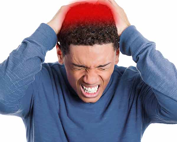 Man holding head with occipital neuralgia pain. Shoreside Interventional Pain, Sarasota, FL.